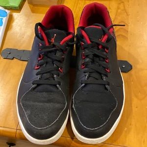 Red and black Jordan 1 Flight 3 Low.